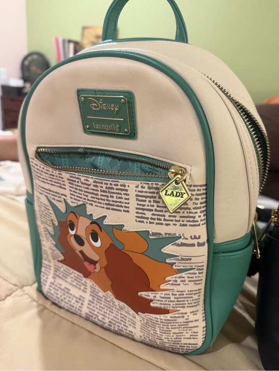 Disney Handbags - Disney Teal & Cream Lady Graphic Mini Backpack